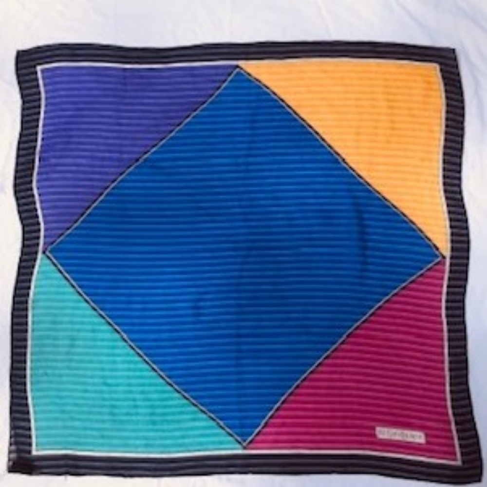 Vibrant color Yves Saint Laurent silk scarf.
